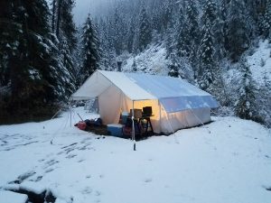 canvas tent in snow