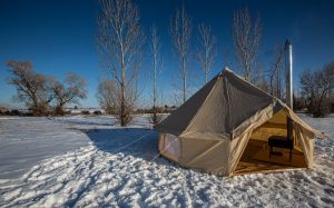 bell tent in snow with window